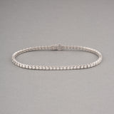 Gold and 1.25 Carats Diamonds French Tennis Bracelet