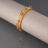 Gold and Precious Stones Bracelet by Régner Paris